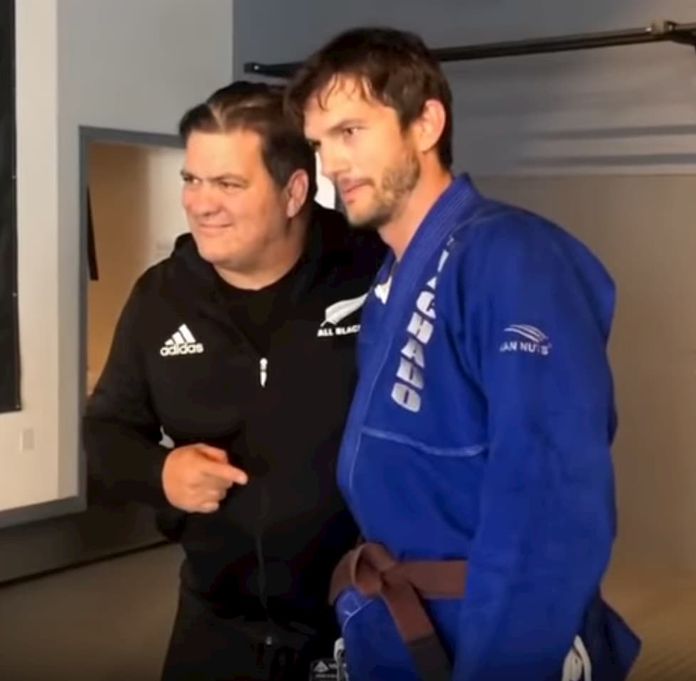Ashton Kutcher pictured with Rigan Machado after receiving his BJJ brown belt